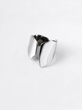 Adjustable sculptural silver ring on a white background