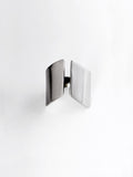 Adjustable sculptural silver ring on a white background