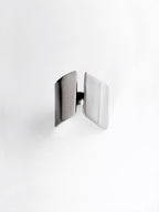 Adjustable sculptural silver ring on a white background